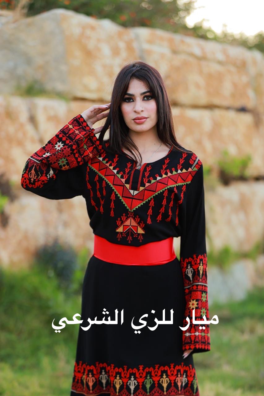 Black dress with red tatreez.