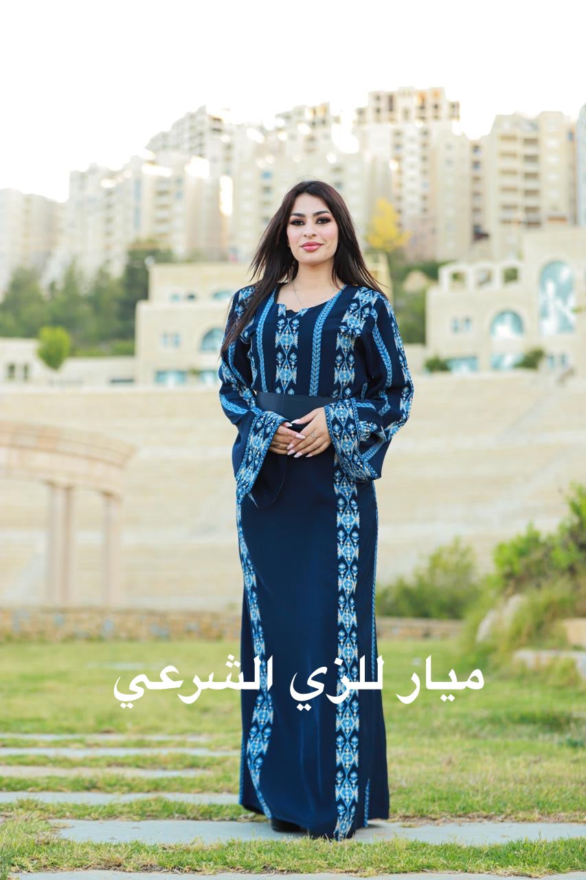 Navy blue dress with shades of blue tatreez.