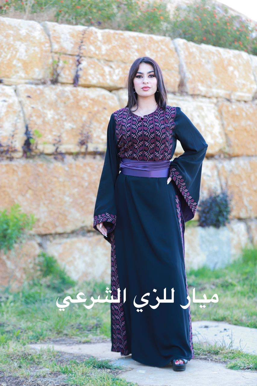 Black and purple tatreez dress.