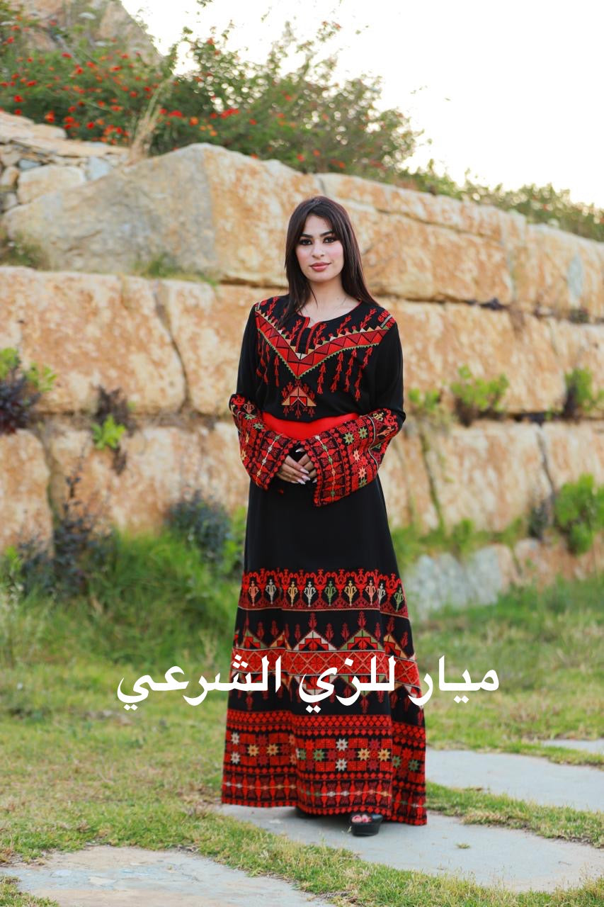 Black dress with red tatreez.