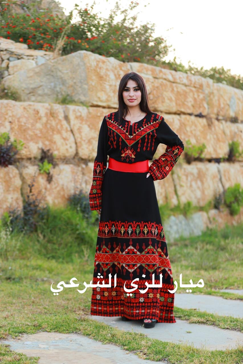 Black dress with red tatreez.