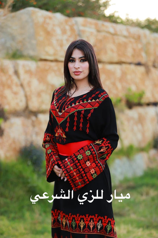 Black dress with red tatreez.