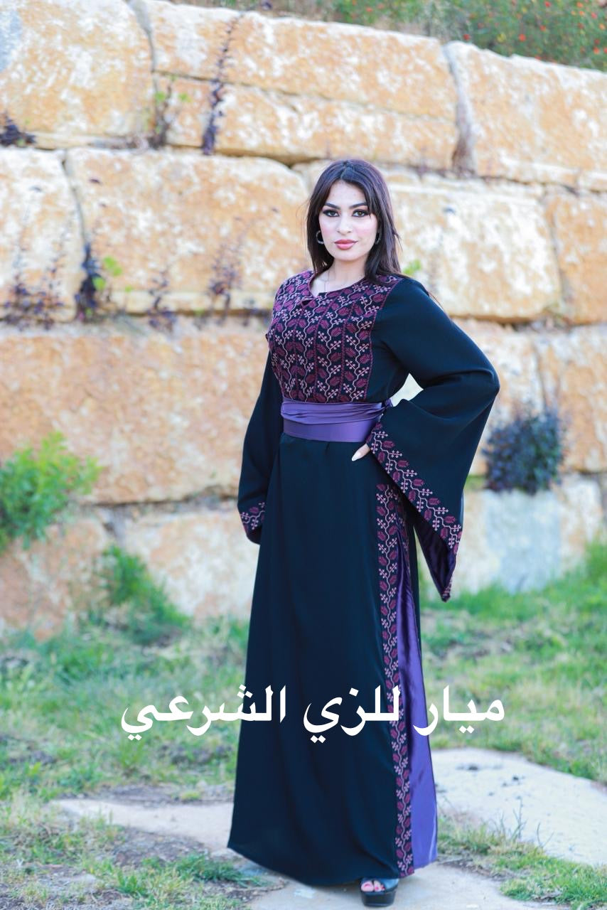 Black and purple tatreez dress.