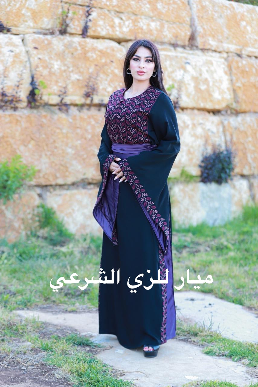 Black and purple tatreez dress.
