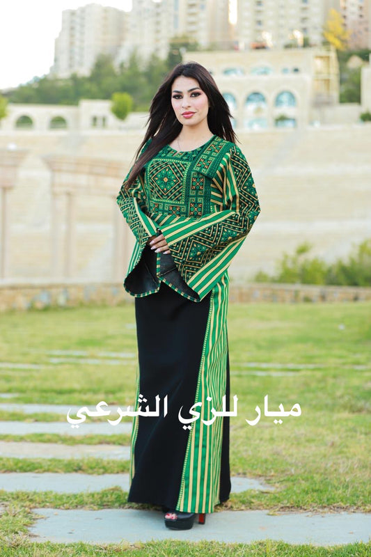 Black and green tatreez thobe.