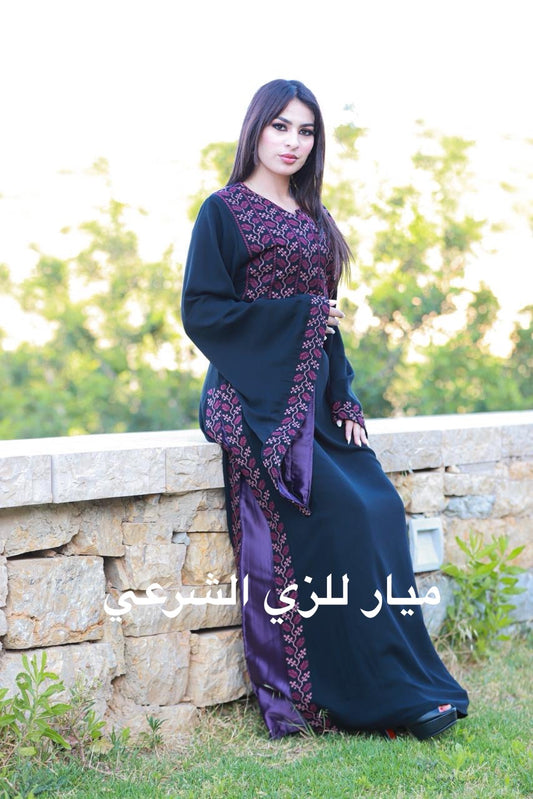 Black and purple tatreez dress.