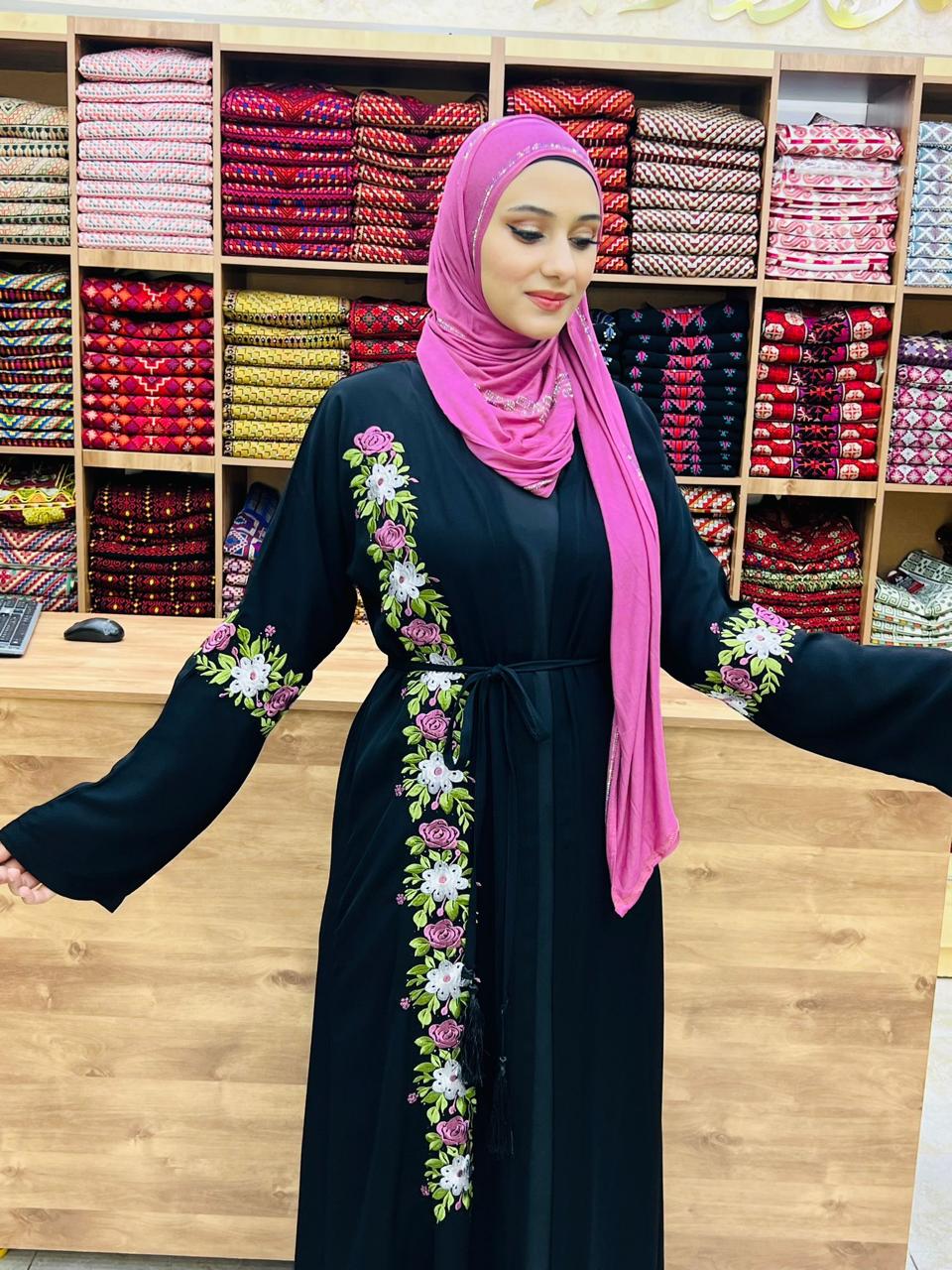 Two pieces black abaya with flower details.