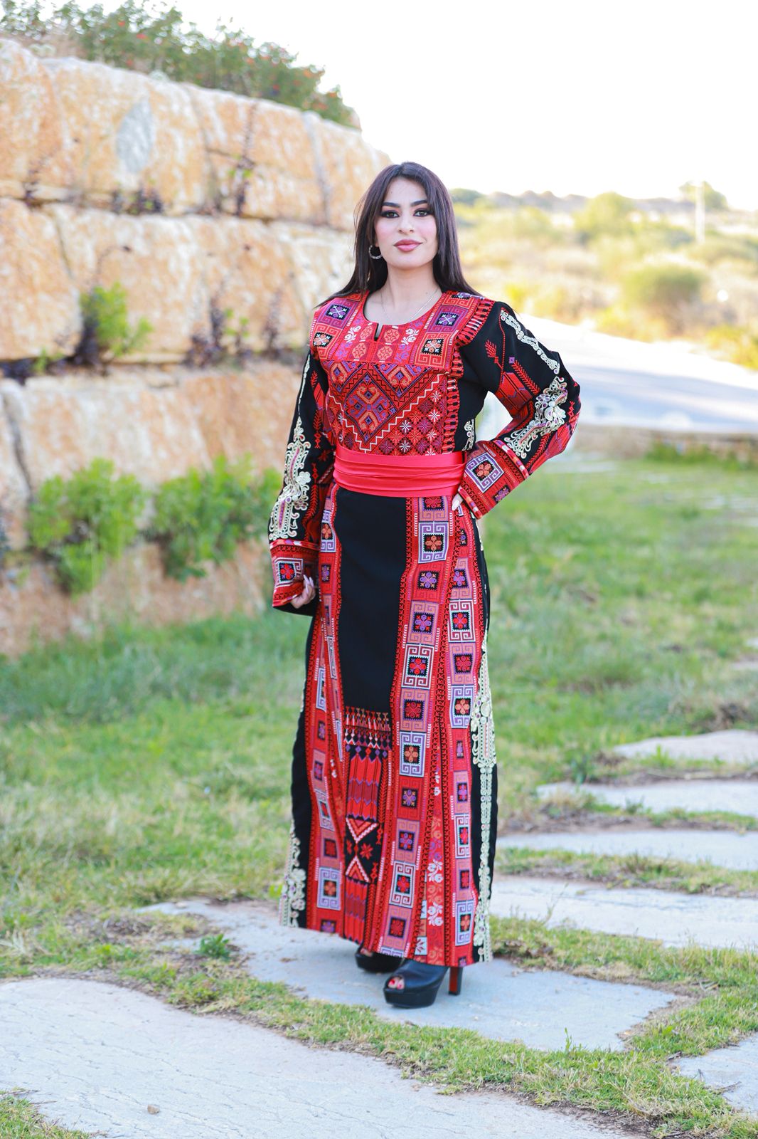 Black thobe with colorful tatreez.