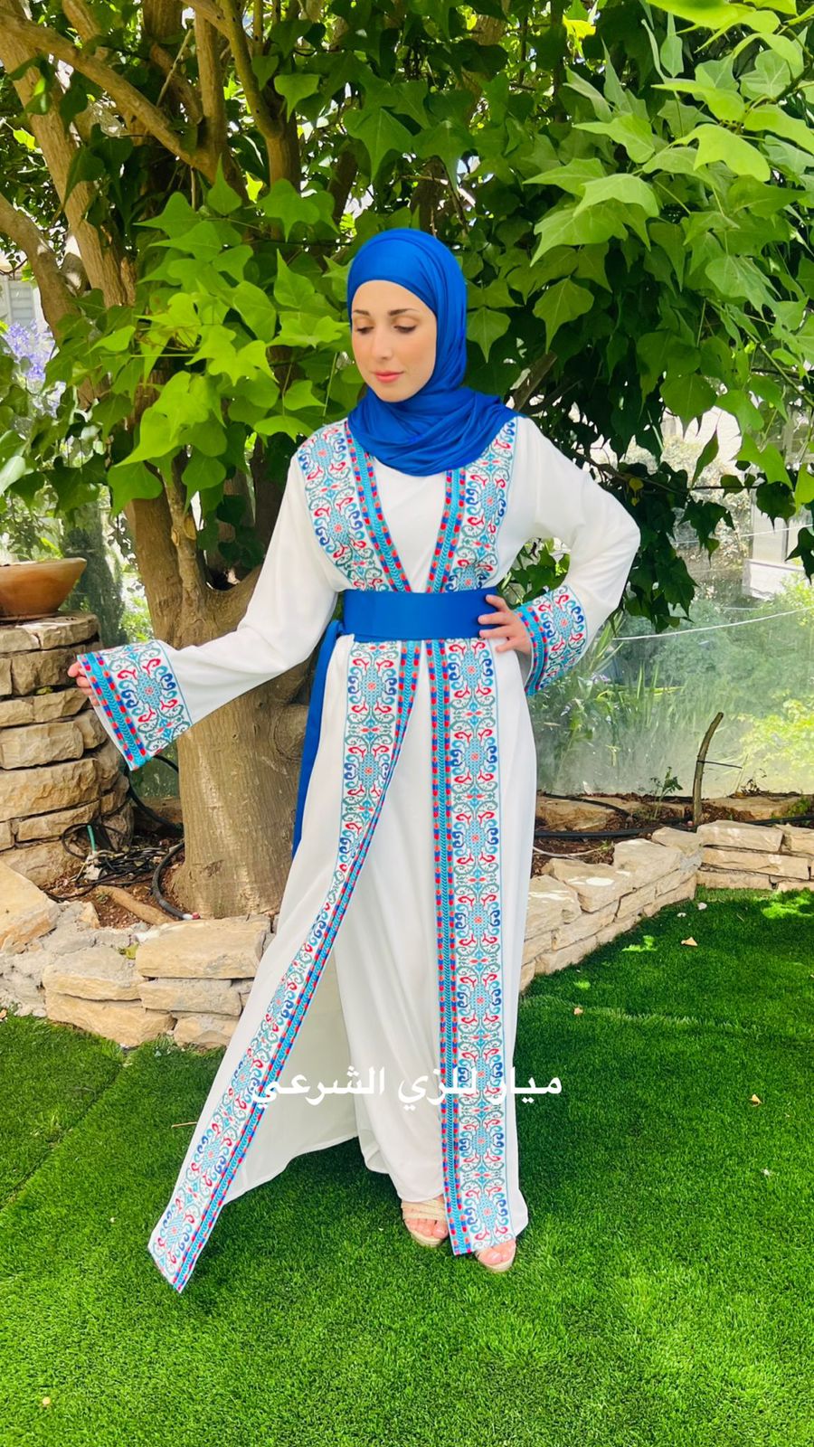 White and blue abaya.