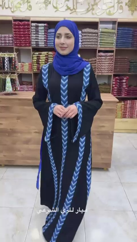 Black abaya with blue details and belt.